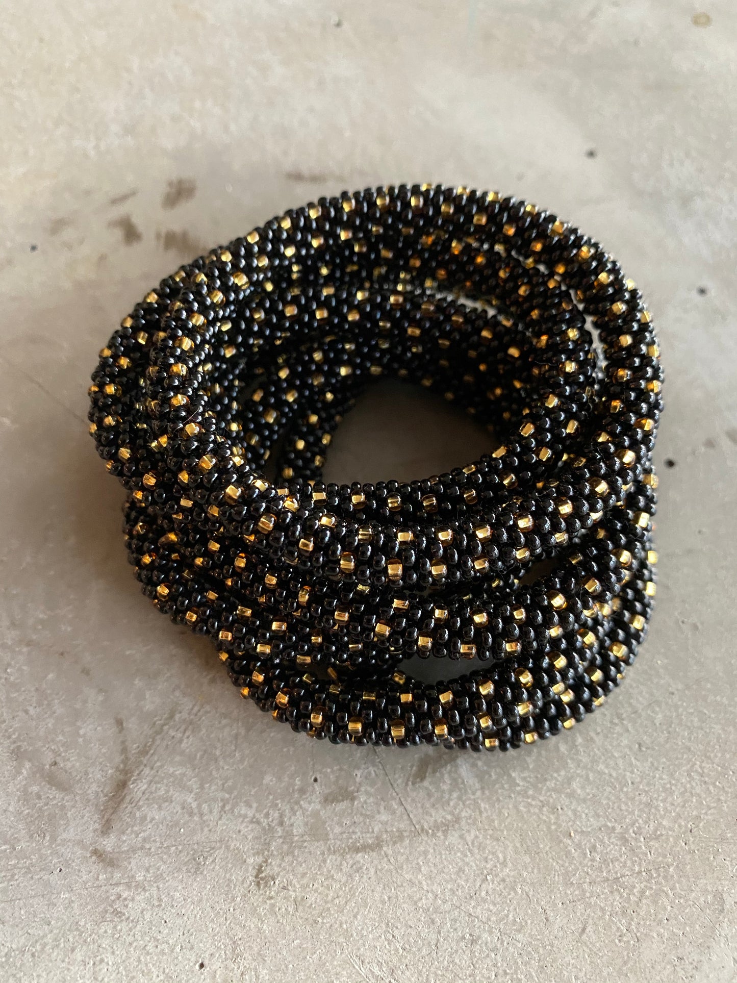 BLACK GOLD STAR BRACELET