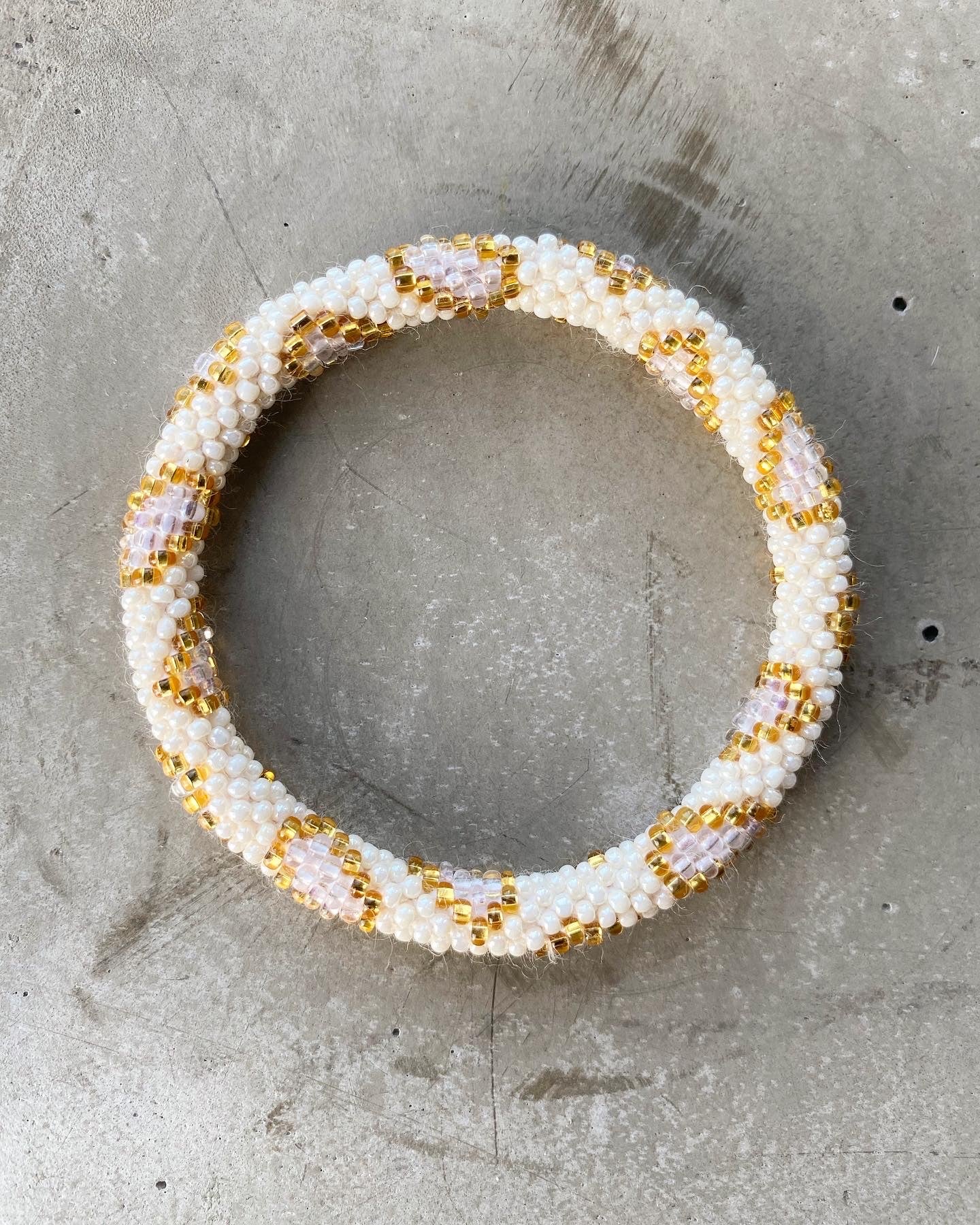 LIGHT NUDE LEO BRACELET