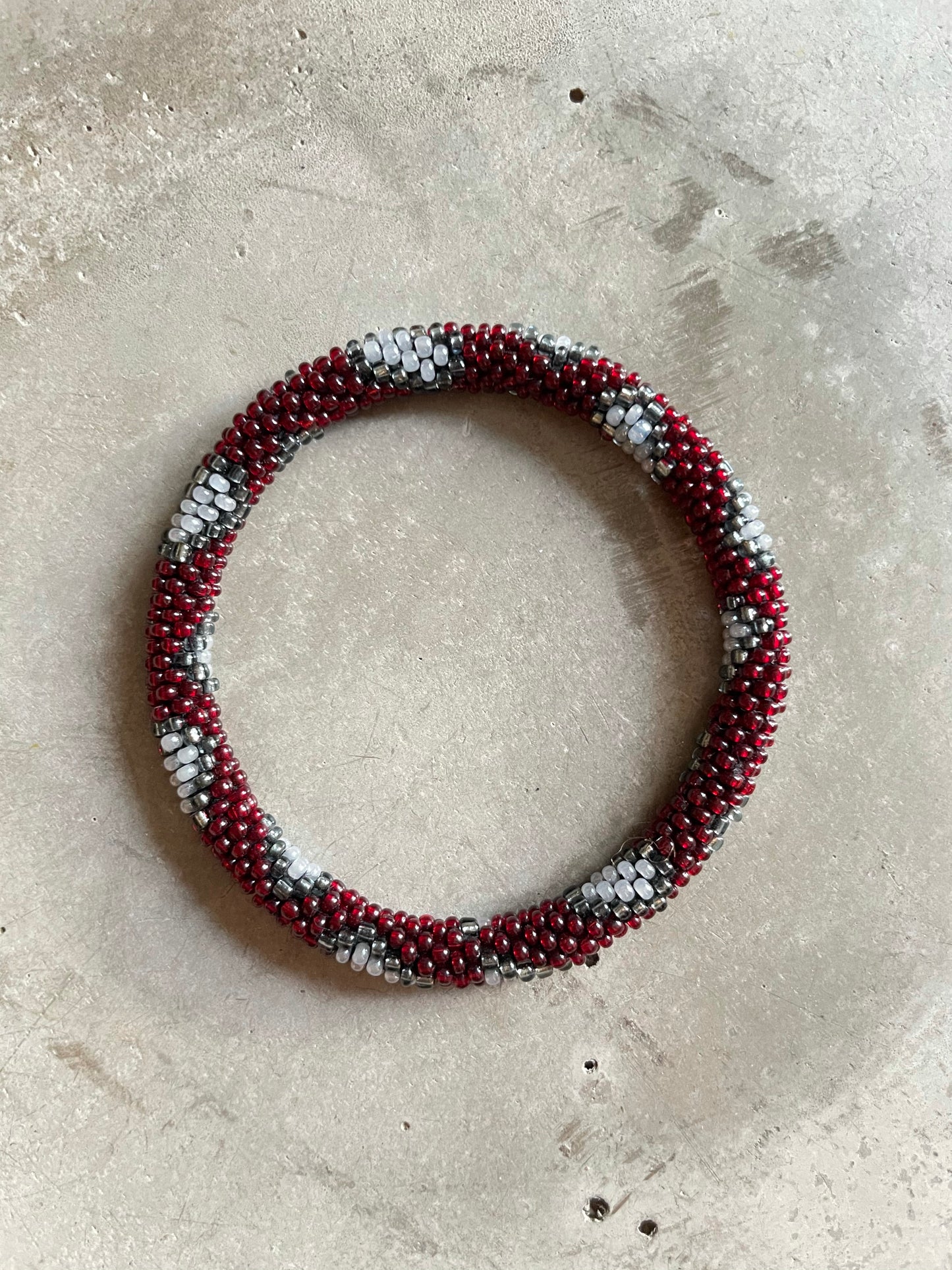 RED LEO BRACELET