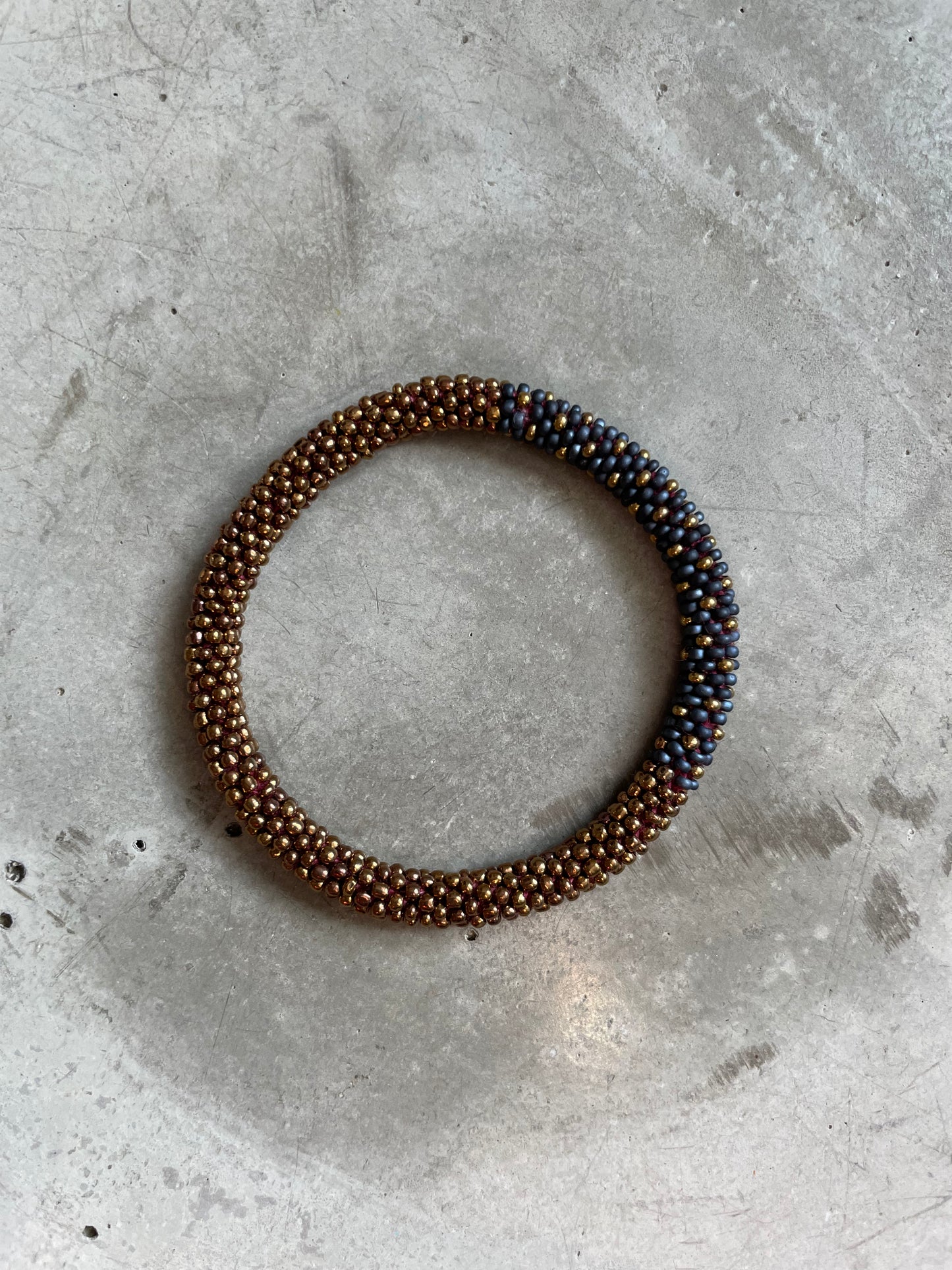 BRONZE BLACK SPOT BRACELET